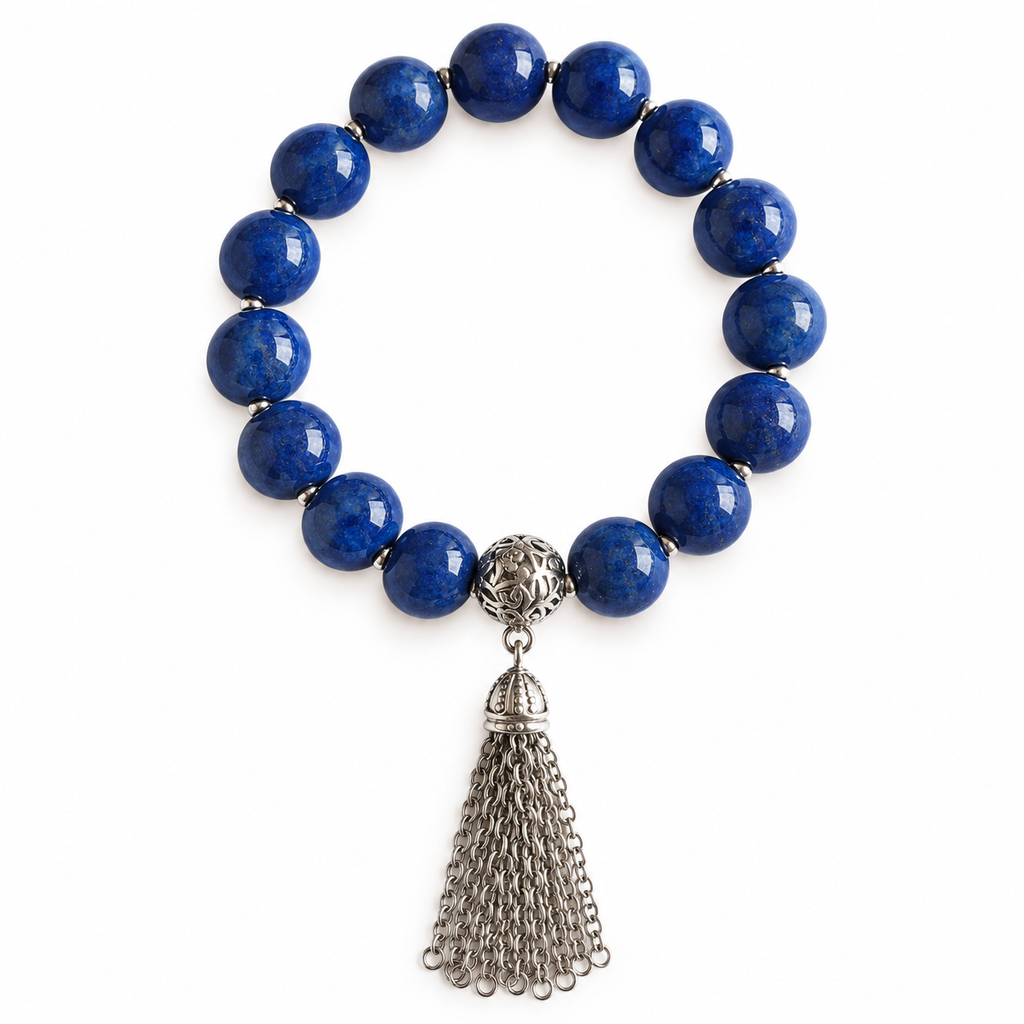 Colours of Fabulous Dazzling Blue Tassel Bracelet on white background with silver chain tassel