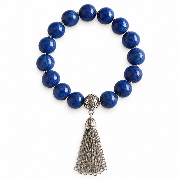 Colours of Fabulous Dazzling Blue Tassel Bracelet on white background with silver chain tassel
