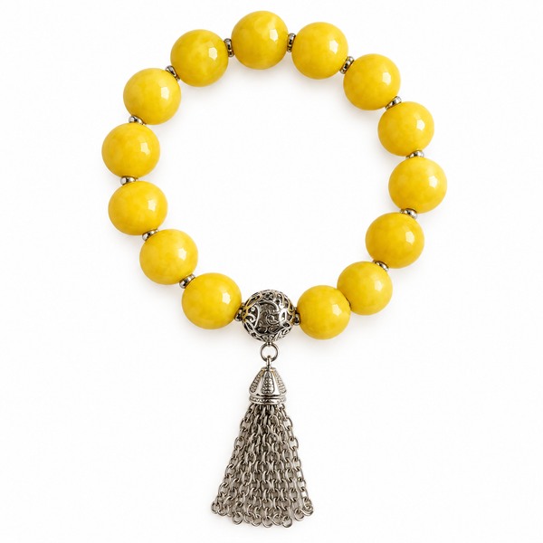 Colours of Fabulous Freesia Tassel Bracelet yellow beads silver chain tassel on white background