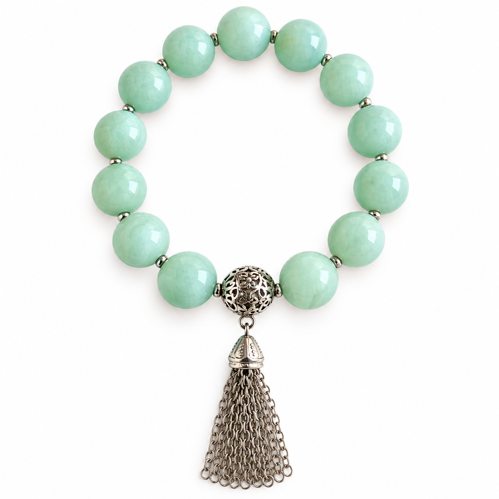 Colours of Fabulous Hemlock Tassel Bracelet pale mint green beads and tiny silver spacers on white background