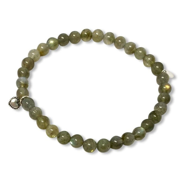 moonstone on an elastic band to create an easy to wear stretchy bracelet for women finished with a sterling silver petite heart, moonstone, stretchy bracelet, bracelet, grey moonstone, stretchy moonstone bracelet, fashion, beautiful jewellery, nz designer, easy to wear jewellery, nz local business, nz jewellery designer, gifts for her, high quality jewellery, well made jewellery, fine jewellery, unique jewellery, sterling silver jewellery, coloured bracelets, bracelets for women