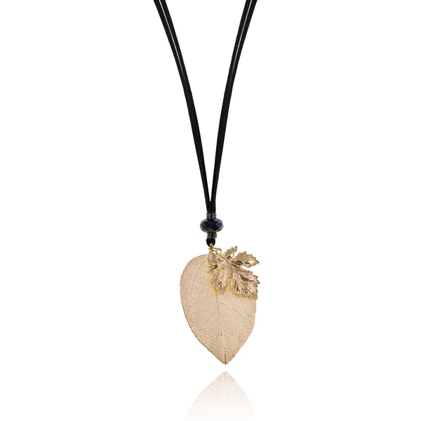 Jewellery, jewelry, designed in nz, nz designer, shop local, women owned business, high quality jewellery, changing seasons, leaf, leaves, fashion jewellery, fashion, well made, everyday wear, light weight jewellery, gifts, gift for her, jewellery for women, anniversary gift, yellow gold necklace, necklace, long necklace, yellow gold jewellery, yellow gold leaf