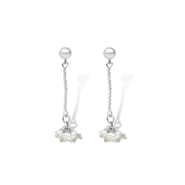 white seed pearl bunch hanging at the end of sterling silver chain and stud style earring, bunches of seed pearls hanging on a sterling silver chain bracelet with bar features, seed pearl bracelet, white seed pearls, white seed pearl bracelet, seed pearl bunch bracelet, unique bracelet, sterling silver bracelet, womens jewellry, unique womens jewellery, jewellery designed in new zealand, new zealand designer, womens fashion, beautiful jewellery, high quality jewellery, auckland designer jewellery, 