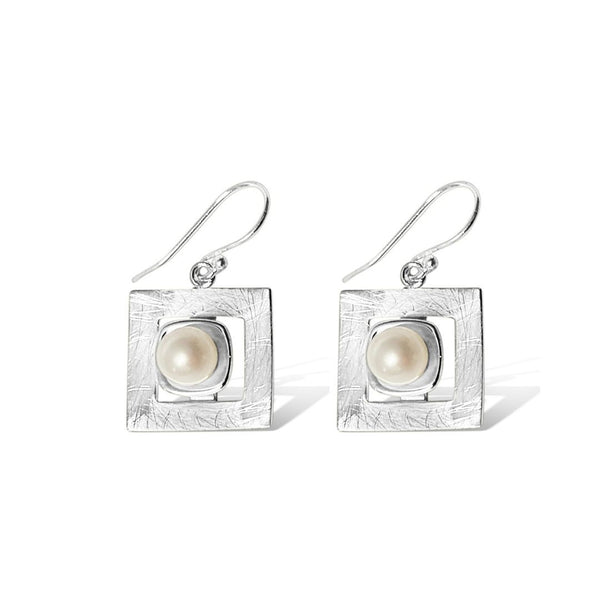 pearl earrings, earrings, sterling silver and pearl earrings, fresh water pearl earrings, fresh water pearl, classic pearls, unique pearls, nz jewellery, designer jewellery, beautiful jewellery, fashion pearls, perfect pearls, pearls for her, mothers day gift nz, mothers day 2022, silver perle, nz jewellery designer, pearl jewellery 